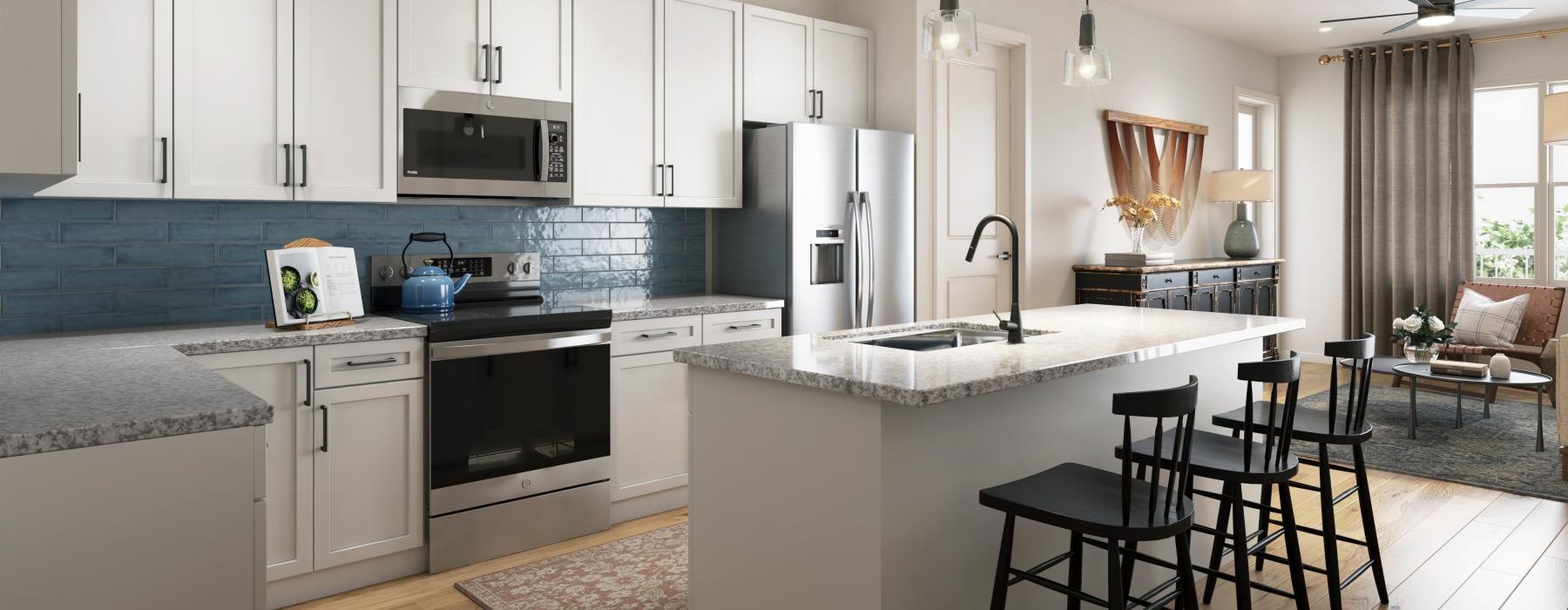 a kitchen with white cabinets